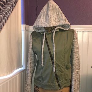 Warm green jacket with soft sweater arms and hood.